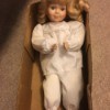 Value of a Porcelain Doll - doll in a cardboard box