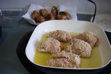 chicken roll ups frying in pan