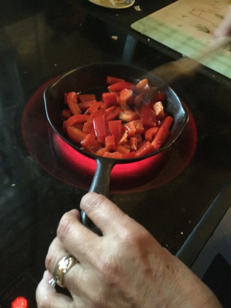 chopped red pepper to pot