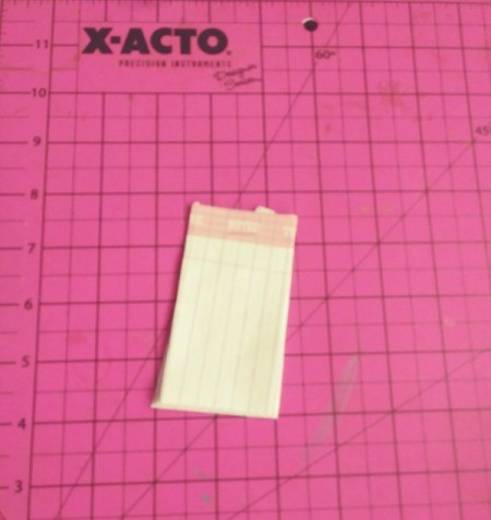 Notepad Stocking Stuffers - tape applied and either trimmed or wrapped around to the back