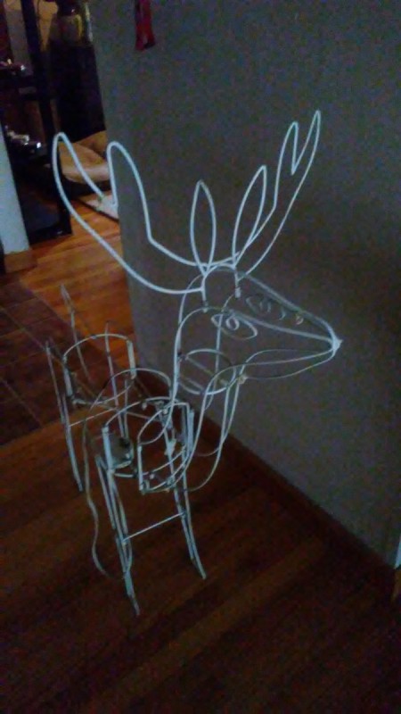 A outdoor reindeer decoration.