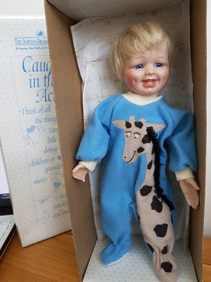 Value of  an Ashton Drake Galleries Doll - doll in giraffe one piece PJ set