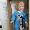 Value of  an Ashton Drake Galleries Doll - doll in giraffe one piece PJ set