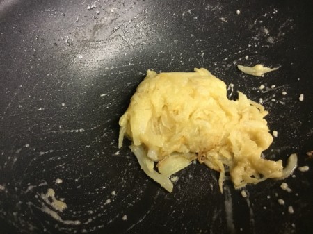 onions and flour in pan