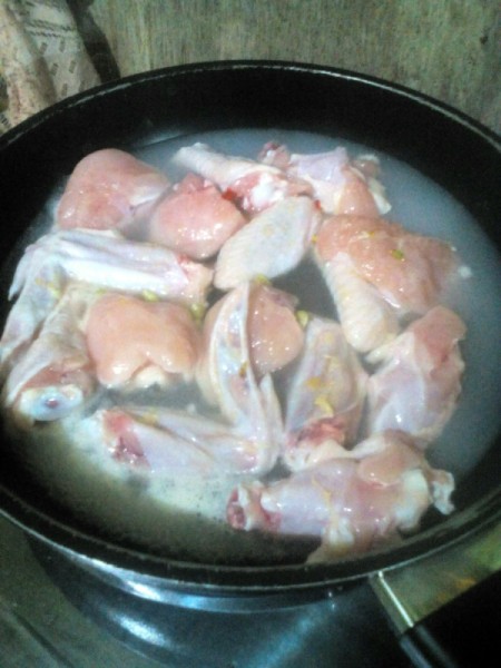 precooking chicken wings in pan