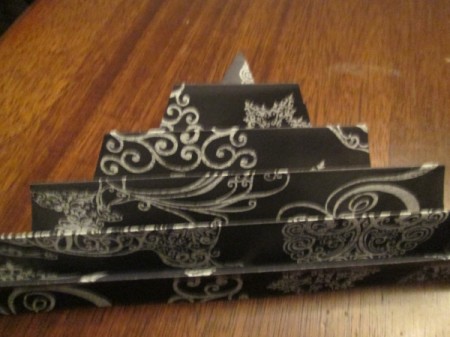 Making Accordion Christmas Trees - folded green paper triangle