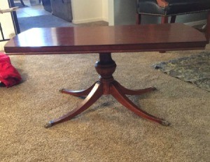Value of Mersman Coffee Table - pedestal coffee table