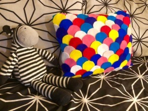 Dragon Scale Pillow - colorful pillow on black and white bed set