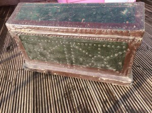 Information on an Antique Trunk - two color trunk with studs over (leather?) sheath
