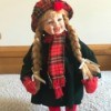 Identifying a Porcelain Doll - doll wearing a plaid hat and scarf