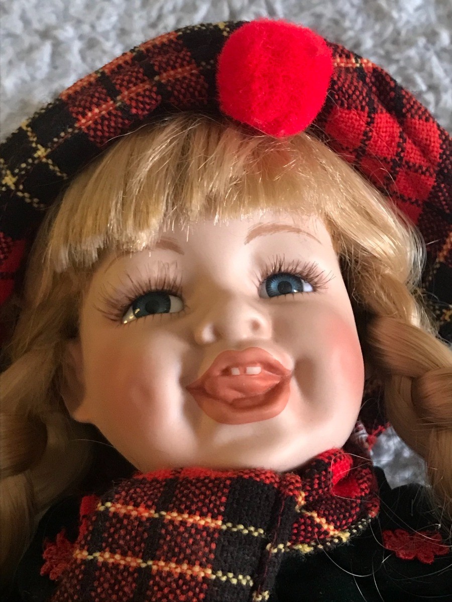 porcelain doll with teeth