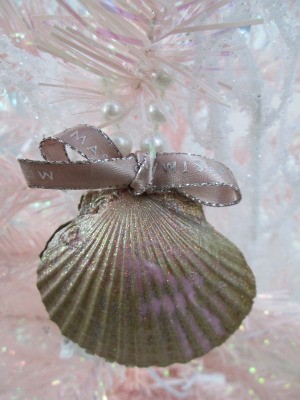 Shabby Chic Shell Ornaments - closeup of ornament with a tiny bow handing in a pink and white tree