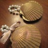 Shabby Chic Shell Ornaments - two shell ornaments, one with a small bow attached