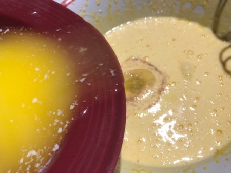 adding egg yolks to batter