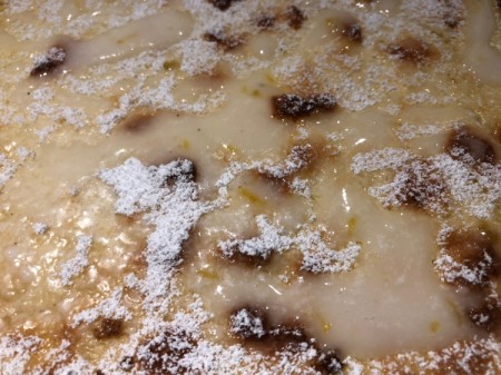 icing & powdered sugar on cake