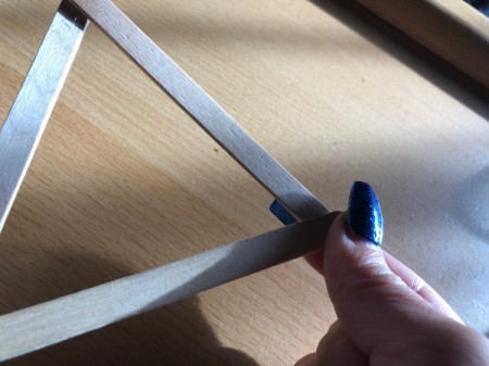 Popsicle Stick Geometric Sculpture - add a third stick and glue the end under the first stick