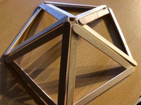Popsicle Stick Geometric Sculpture - flip over and pull up so that the two open ends meet and tape them together