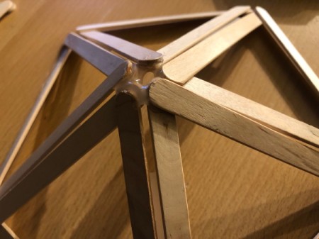 Popsicle Stick Geometric Sculpture - hot glue the center of the dome and hot glue the joints at the bottom