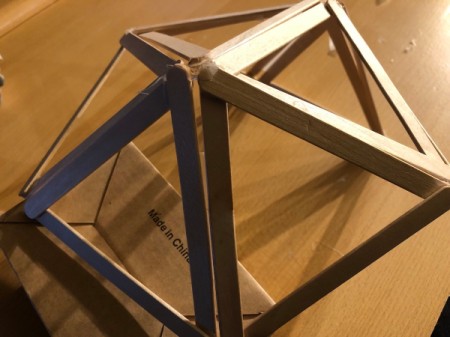 Popsicle Stick Geometric Sculpture - lift the dome up and tape the three triangles to it then glue the joints