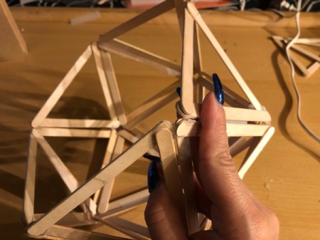 Popsicle Stick Geometric Sculpture - add the 4 triangle segment and glue