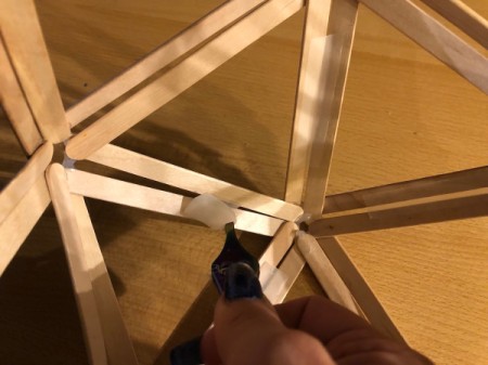 Popsicle Stick Geometric Sculpture - before glueing on the bottom dome use tweezers to remove tape