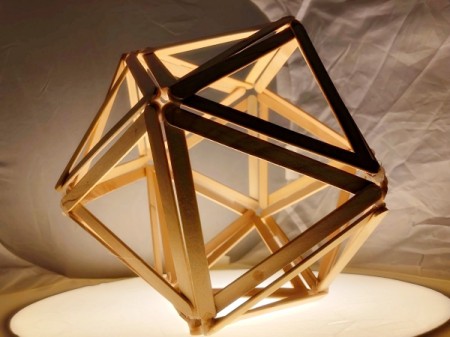 Popsicle Stick Geometric Sculpture - sitting on a light box