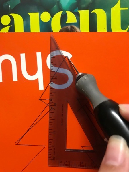 Recycled Christmas Card - cut out the tree shape using an X-acto knife