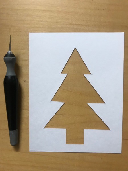 Recycled Christmas Card - tree cutout on the cardboard