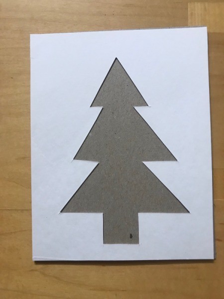 Recycled Christmas Card - use cutout as a template and place over the other heavier piece of cardboard