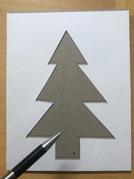 Recycled Christmas Card - trace the tree shape onto the cardboard