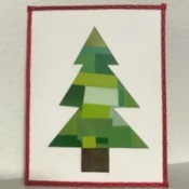 Recycled Christmas Card - finished card on shelf against white background
