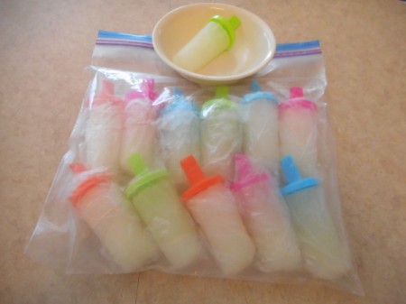 wrapped frozen Lemon Lime Popsicles in plastic bag