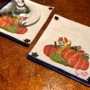 Personalized Decoupaged Napkin Coasters - two coasters, one with a stemmed glass base visible