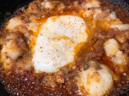 cooking egg in Chorizo Potato  Skillet