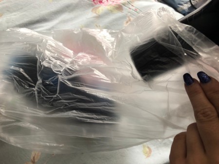 Using a hair dryer to quickly dry socks.