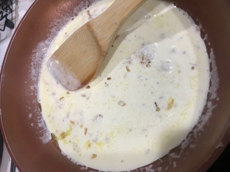 Creamy sauce in pan