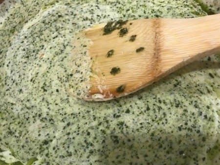Pesto added to cream sauce