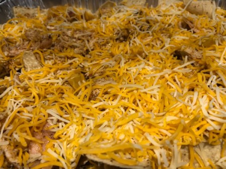 cheese spread on nachos