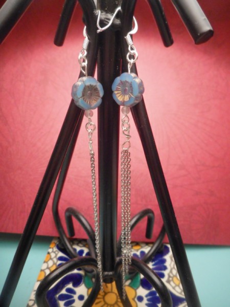 Broken Chain Earrings - set of earrings attached to a display stand