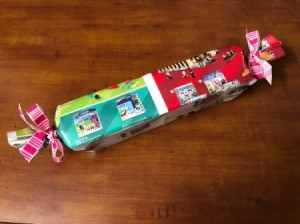 Using Toy Catalog Pages as Gift Wrap - wrapped gift