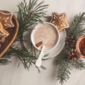 Gingerbread cookies, sprigs of pine and a cup of hot chocolate.