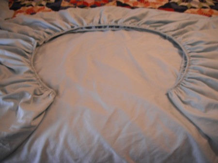 Folding Fitted Sheets - smooth sheet and fold sides so it lies flat