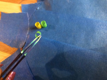 Fused Plastic Straw Ornament - use tweezers to create the design on the tape