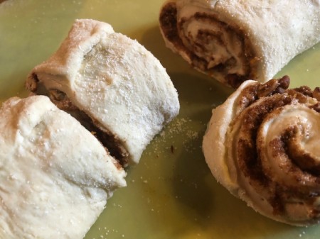 cutting Orange Pecan Cinnamon Rolls