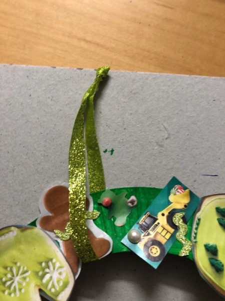 Kids' Cutout Paper Wreath - knot the ribbon to make a hanger