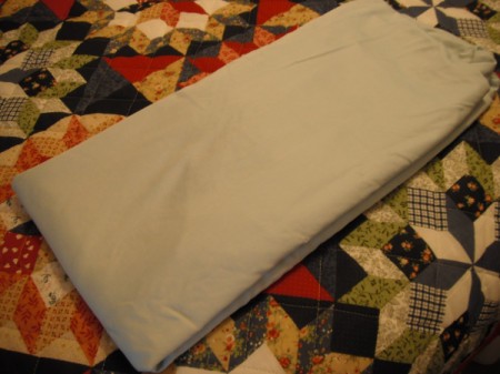 Folding Fitted Sheets - fold again end to end