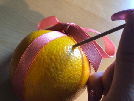 How to Make Orange Clove Pomanders - poke holes on dots with a toothpick