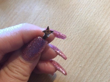 How to Make Orange Clove Pomanders - you can break the heads off of some of the cloves to create star shapes