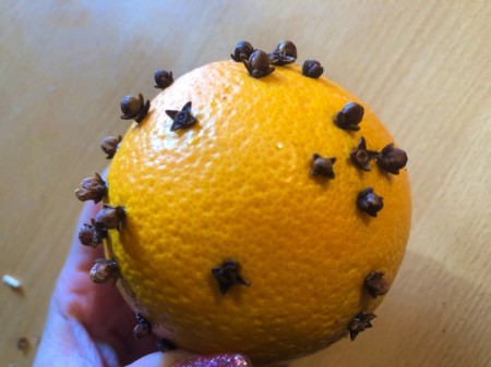 How to Make Orange Clove Pomanders - continue making more designs on other oranges