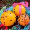 How to Make Orange Clove
Pomanders - three variations resting on a bed of evergreen branches
